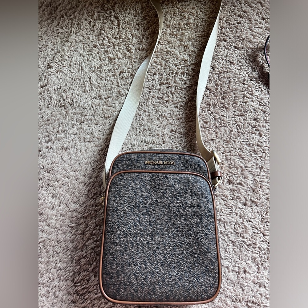 Michael Kors cross body flight bag